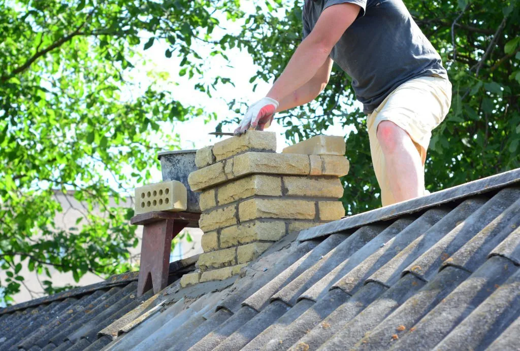 Laying new brick on a chimney